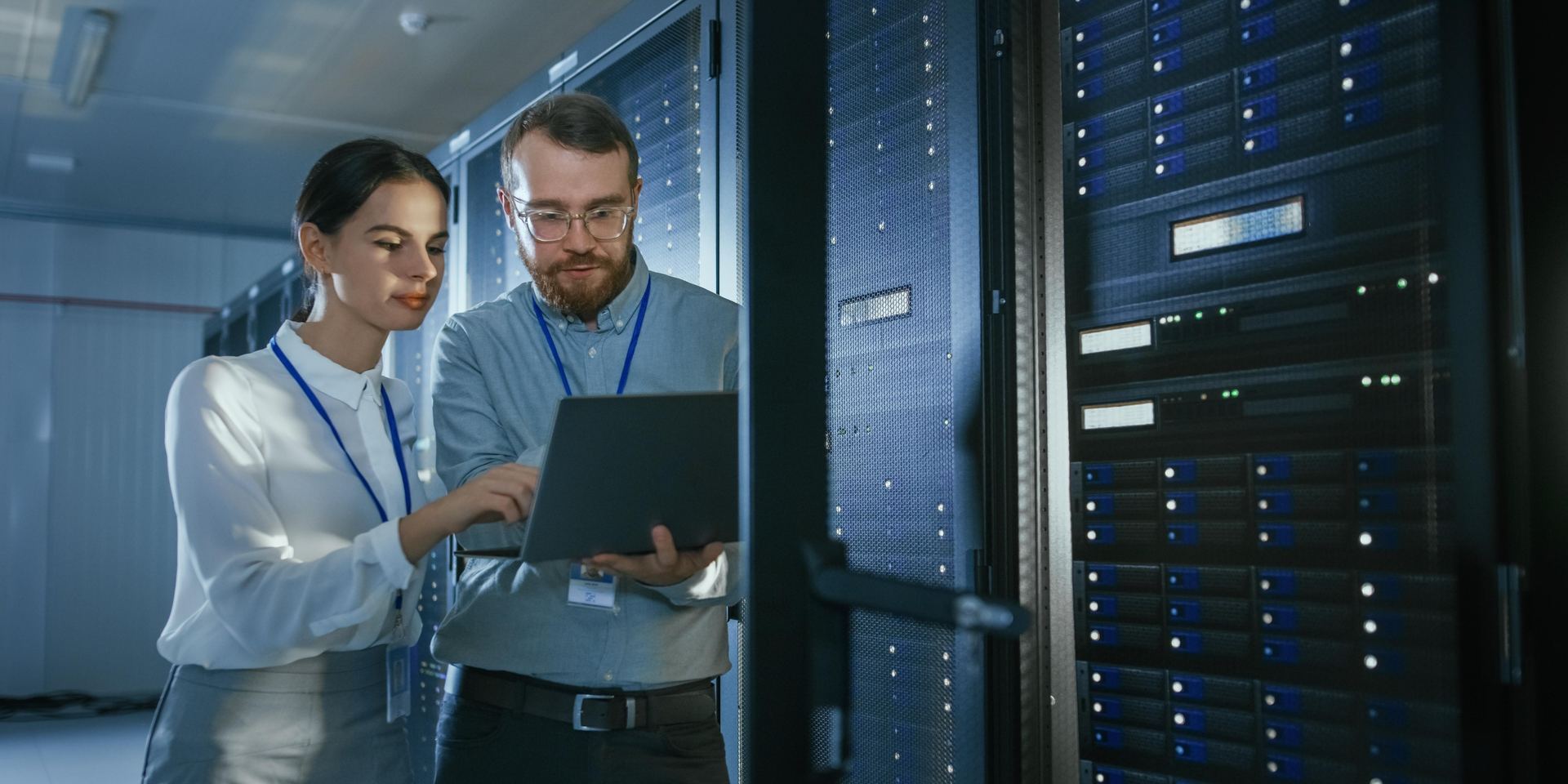 IT engineers reviewing server security for a CCPA cybersecurity audit