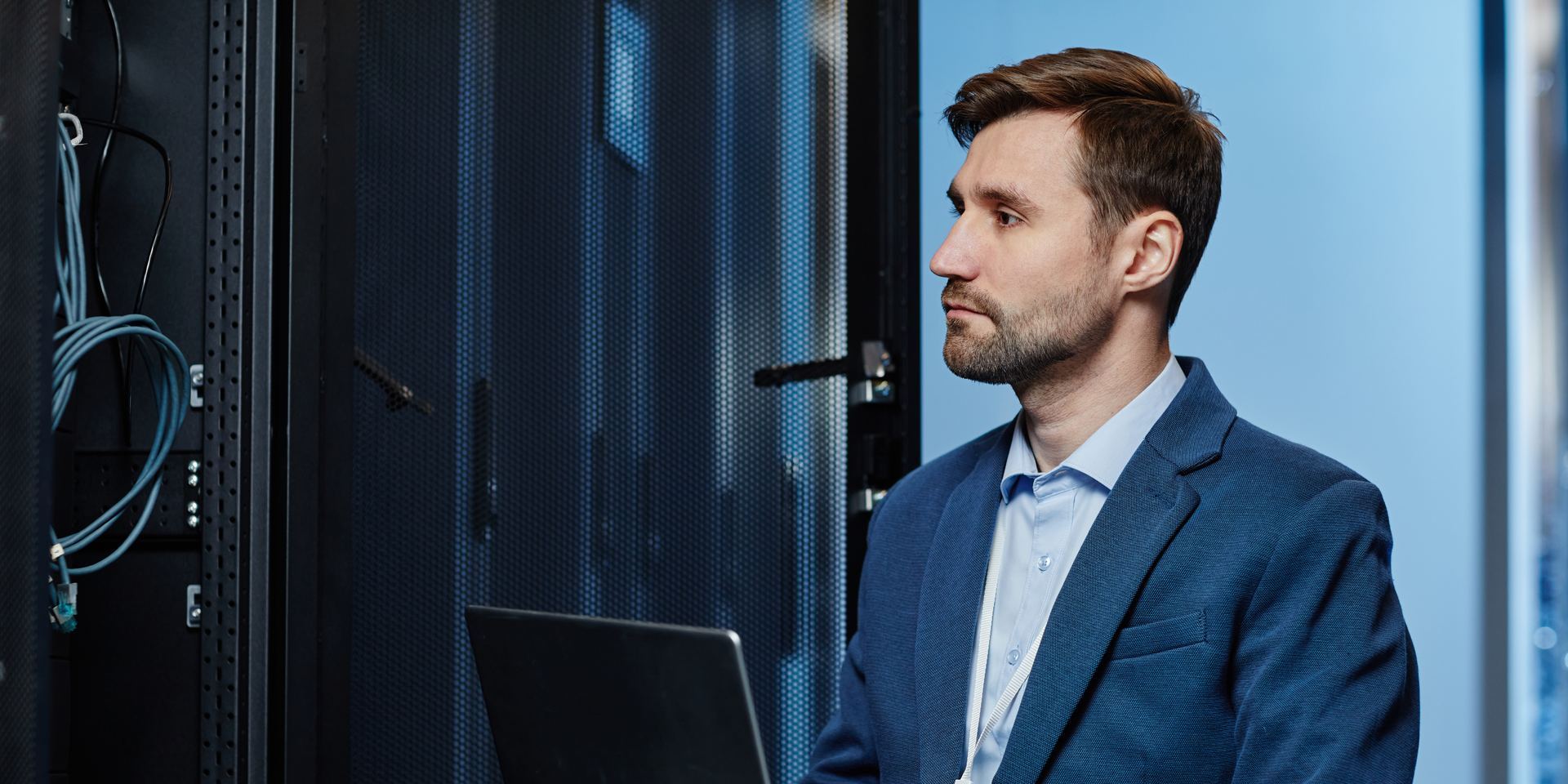 Systems engineer in a server room responsible for CCPA technical controls