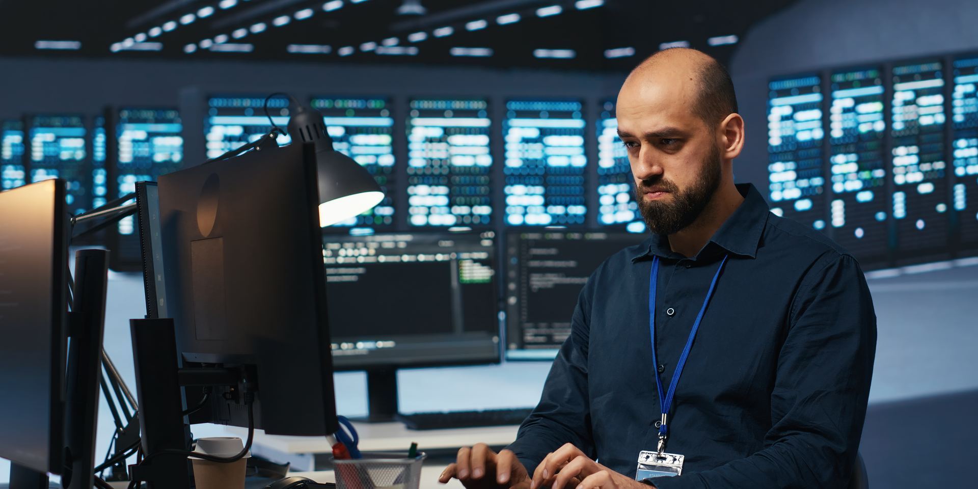 IT specialist monitoring security systems that protect personal information