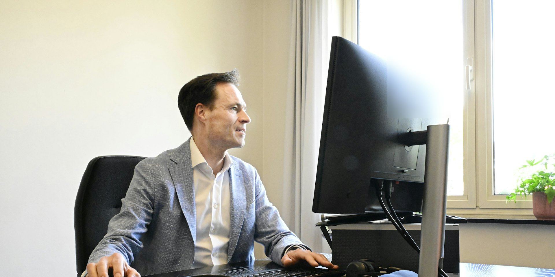 CCPA Implementation Roadmap: From Data Map to Documented Evidence 1 IT manager at his desk planning CCPA implementation