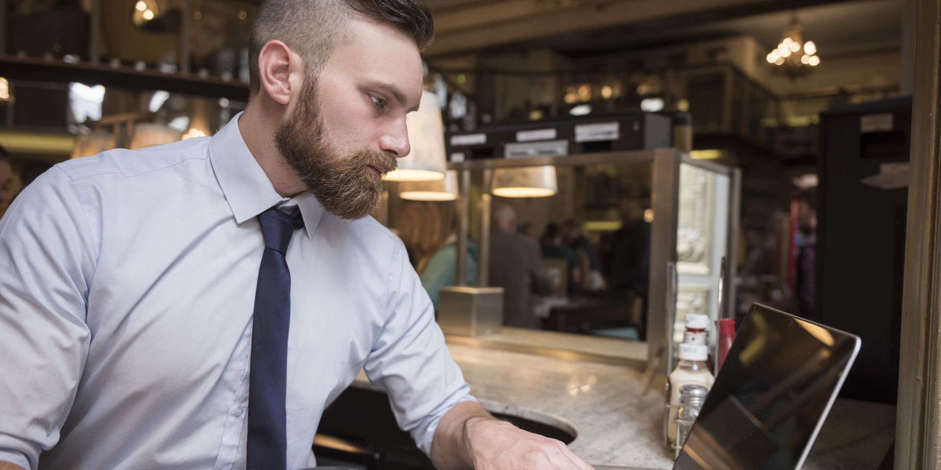 Professional reviewing follow-up results at his desk